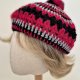 Beret z pomponem.