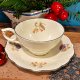 Filiżanka ze spodkiem Spenzo S. Polak & Sons – powój, złocenia, porcelana vintage