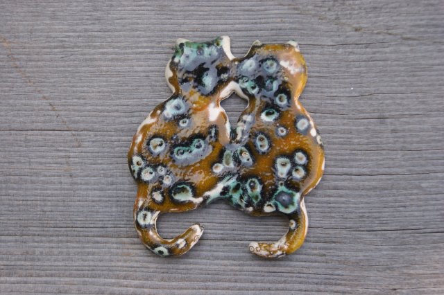 Ceramiczny magnes koty