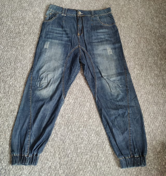 Męskie jeansy ze ściągaczami