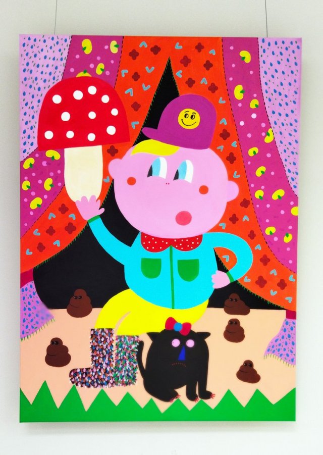 Obraz na płótnie 80 x110 cm. Pączek siedzący na kotku.