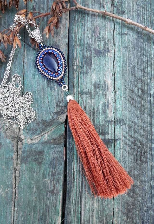 ,,wisior z rudym ogonem,,