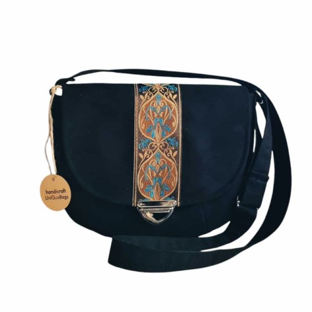 Niewielka torebka listonoszka na długim pasku retro boho