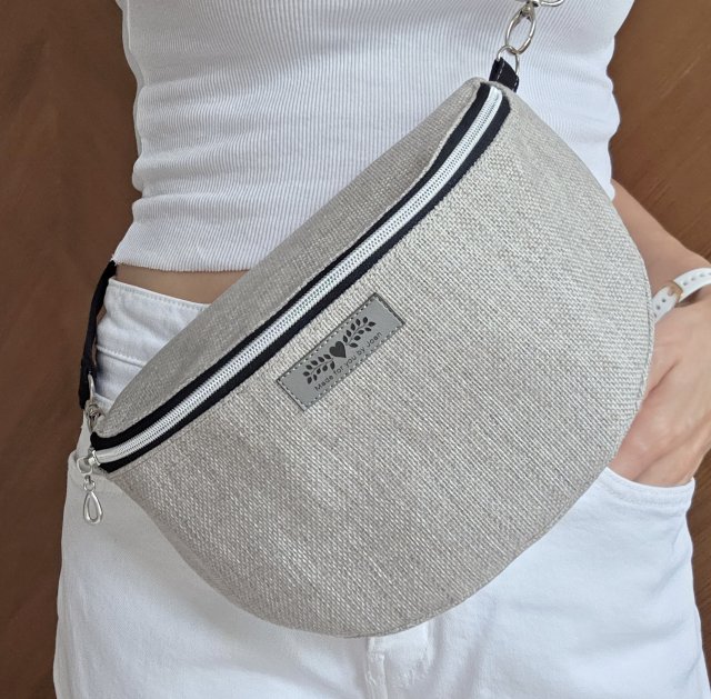Beżowa nerka na ramię z plecionego materiału boho
