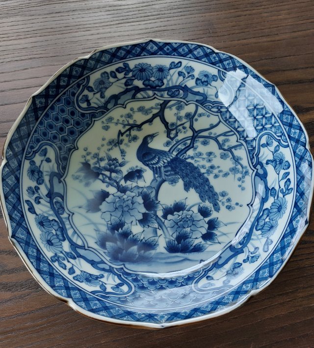 Orientalna misa dekoracyjna paw kwiaty