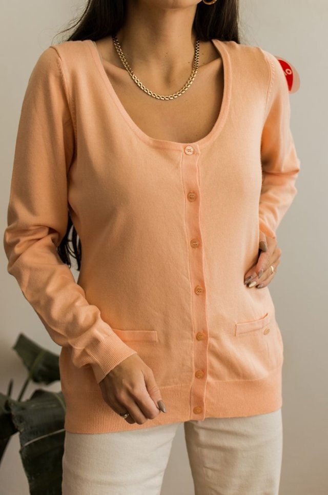 nowy brzoskwiniowy sweterek M/L