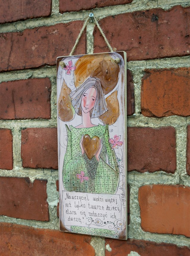 Deseczka z sentencją "Nauczyciel widzi więcej niż tylko twarze dzieci..."