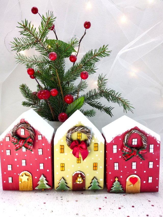 Świąteczne miasteczko pełne ciepła. Drewniane domki.