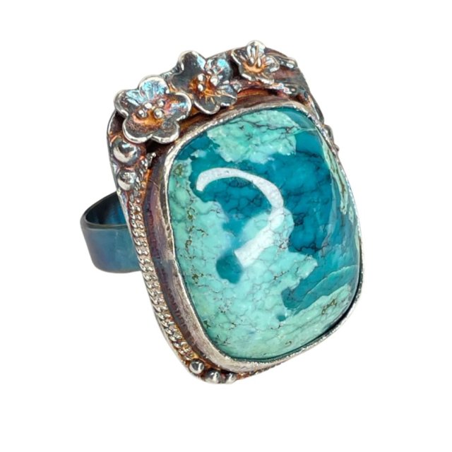 Srebrny pierścień z turkusem w kwiatowej oprawie a1132