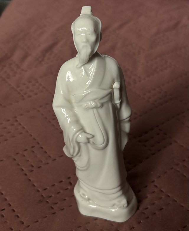 Orientalny mędrzec ciekawa i niespotykana figurka porcelanowa