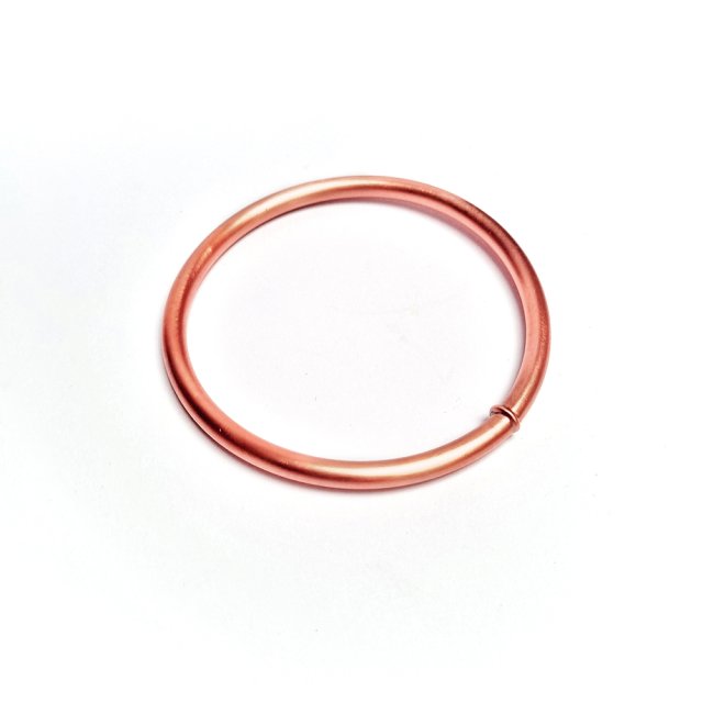 Bransoleta - koło. Czysta miedź plus kryształy górskie wewnątrz