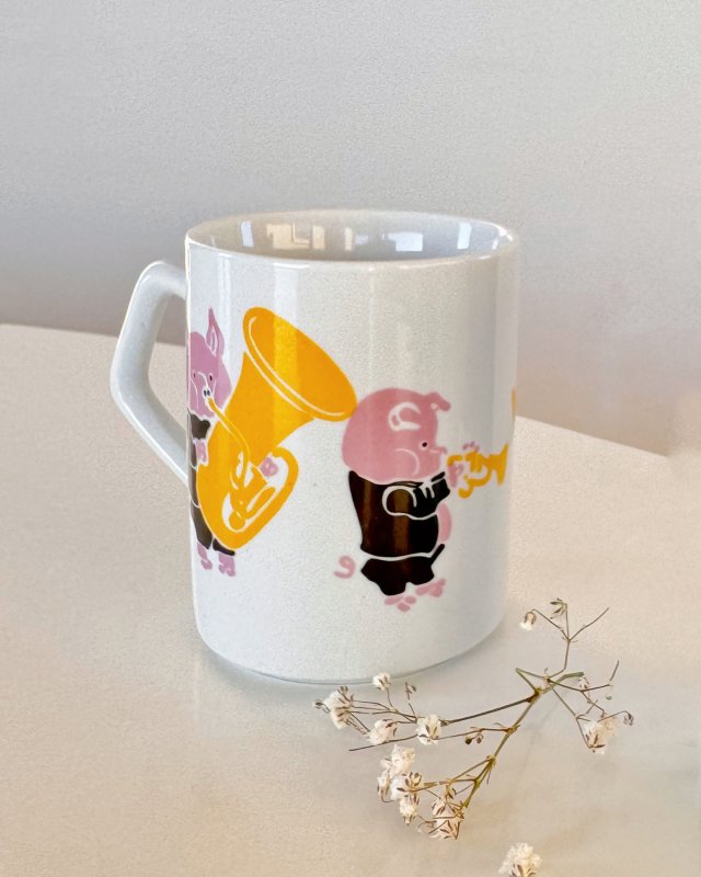 Kubek z orkiestrą prosiaczkową