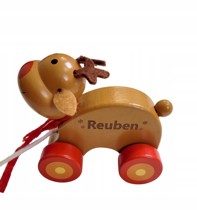 REUBEN renifer drewniana zabawka na sznurku