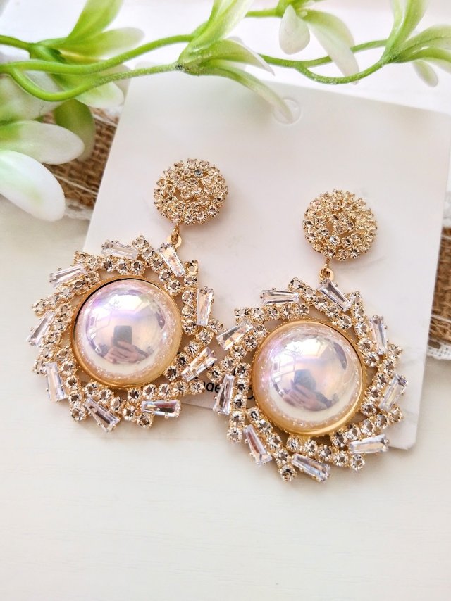 Bogate kolczyki z perłą