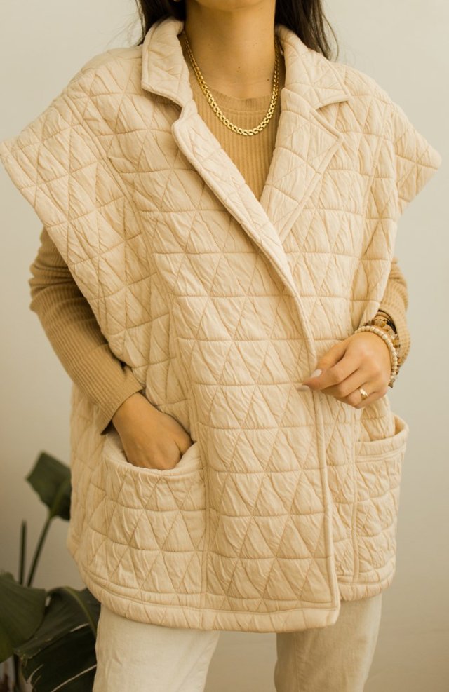 kremowa kamizelka 44