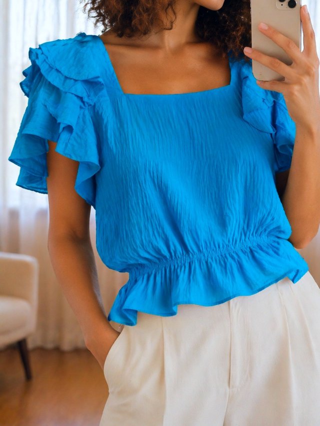 Błękitna bluzka caro Gina Tricot