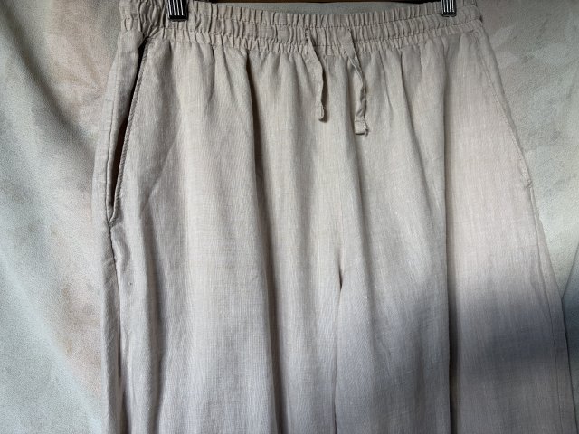 Lniane spodnie z kieszeniami elegancki beż szerokie nogawki