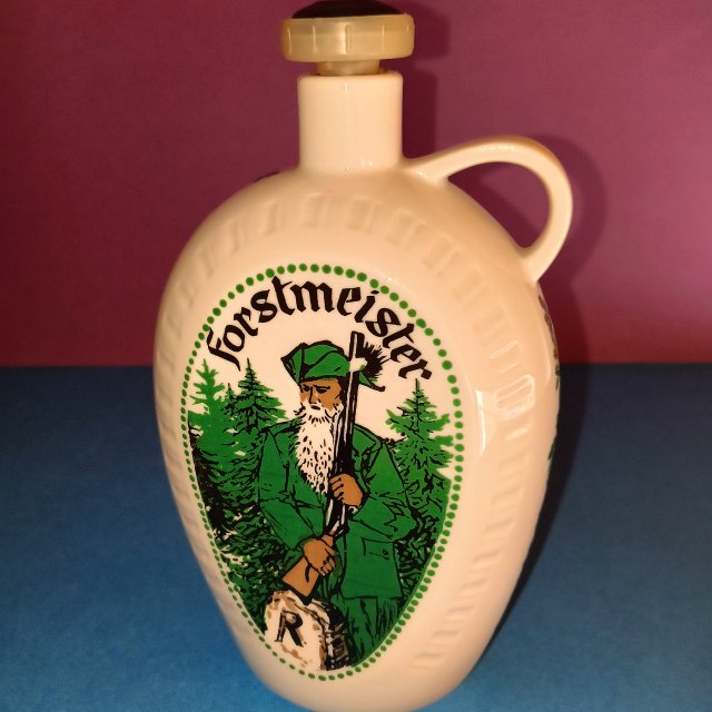 Pusta butelka porcelanowa z motywem leśnika_NRD Veb Eisfeld - stan idealny