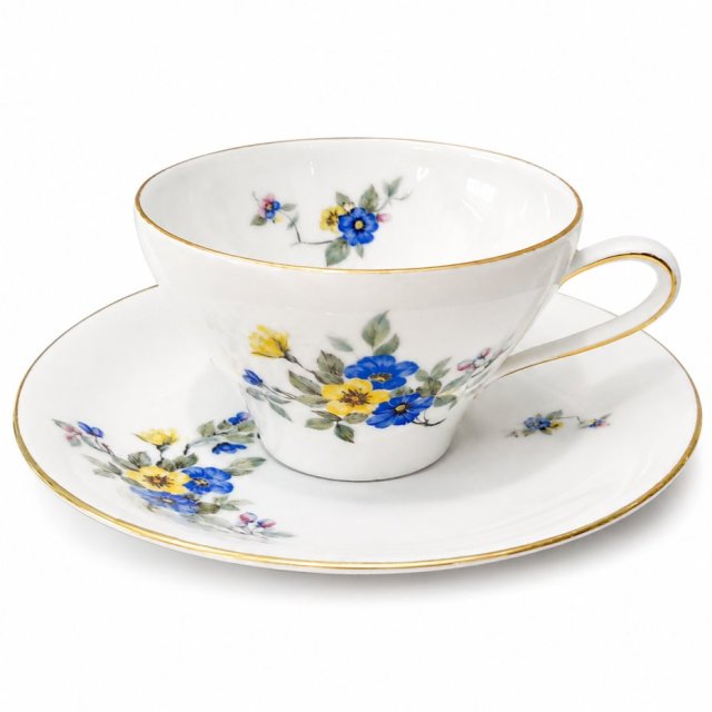Niemiecka porcelana filiżanka i spodek z kwiatowym motywem