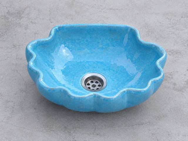 Umywalka ceramiczna  w kształcie muszelki