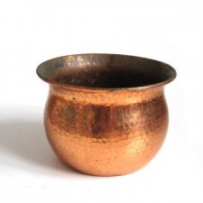 miedziana osłonka na donicę