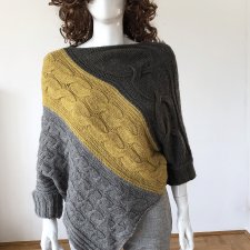asymetryczny sweter warkocze
