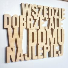 Napis Wszędzie dobrze, ale w domu najlepiej