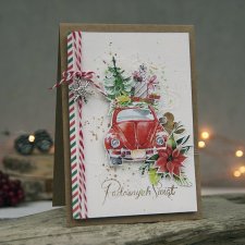 Świąteczna kartka z czerwonym garbusem i ludzikiem z piernika