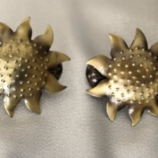 Klamry do zasłon Słońca