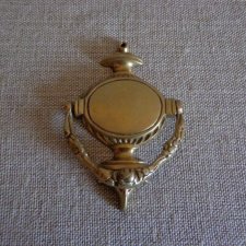 Mosiężna kołatka do drzwi