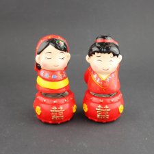 Ceramiczne kiwające się lalki