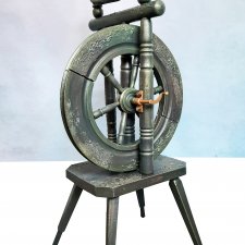 Stary kołowrotek ręcznie stylizowany.