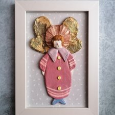 Ceramiczny różowy anioł oprawiony w ramy