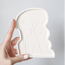 Podkładka pod świecę biżuterię kobieta z kolczykiem