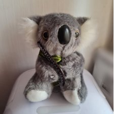 Misiek koala z Australii z bumerangiem