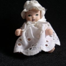 malutka lalka- porcelana