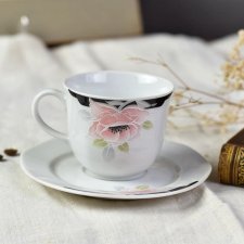 Porcelanowa filiżanka i spodek z motywem kwiatowym