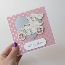 Kartka ślubna z parą młodą na motocyklu