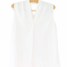 Wyrafinowany minimalizm biała bluzka vintage elegancki top Next 38 piękne detale