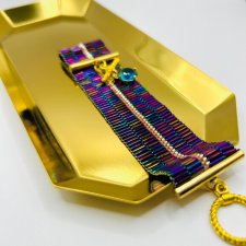 Elegancka bransoletka, mieniąca się różnymi kolorami :)