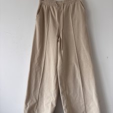 Beżowe szerokie welurowe spodnie dresowe z wysokim stanem i kieszeniami — L xl