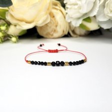 Ochronna z Turmalinem na czerwonym sznureczku