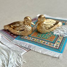 Luxury ❤ 24-karat gold-plated Dubai duck salt and pepper set.