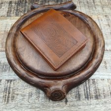 Ręcznie szyty portfel męski ze skóry garbowanej roślinnie.