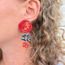 Czerwone kolczyki z twarzą handmade z gliny polimerowej