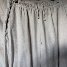 Lniane spodnie z kieszeniami elegancki beż szerokie nogawki