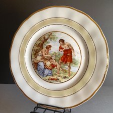 Talerz ze sceną przycinania skrzydeł amorkowi (26 cm). Stan idealny minus