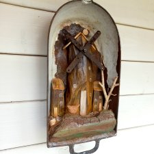 Rustykalna dekoracja z wiatrakiem w starej gęsiarce